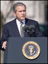 President George W. Bush speaking at the JSC Memorial Service in Houston. Photo courtesy of NASA.