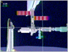 NASA computer image of Space Shuttle Discovery docking with the International Space Station