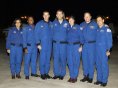 The Columbia crew arrives at KSC Sunday night. NASA photo KSC-03PD-0058.