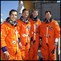 (L-R): STS-113's Mission Specialist John Herrington, Pilot Paul Lockhart, Commander James Wetherbee and Mission Specialist Michael Lopez-Alegria.  They will be bringing the Expedition Six crew up to the ISS, and returning home with the Expedition Five crew. NASA photo KSC-02PD-1622.