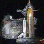Space Shuttle Endeavour sits on Launch Pad 39A Sunday night after an oxygen line leak forced managers to delay the liftoff. NASA image.