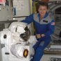 'I thought I told you guys not to leave your spacesuits lying around!' No, Peggy is not anybody's mom - she is just doing her part in this pic from her stay at the ISS. NASA photo.